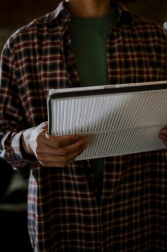 Close-up of a new vehicle cabin air filter, highlighting clean pleats.